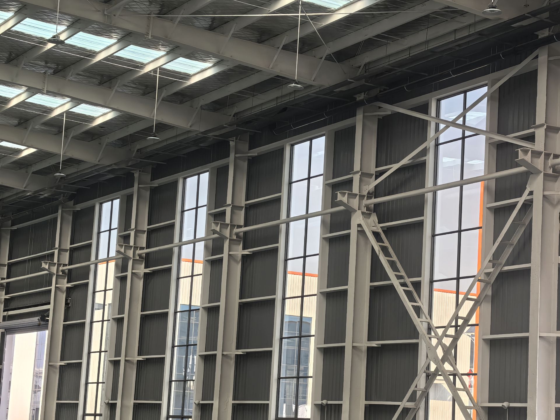 Detailed view of steel columns and wall bracing