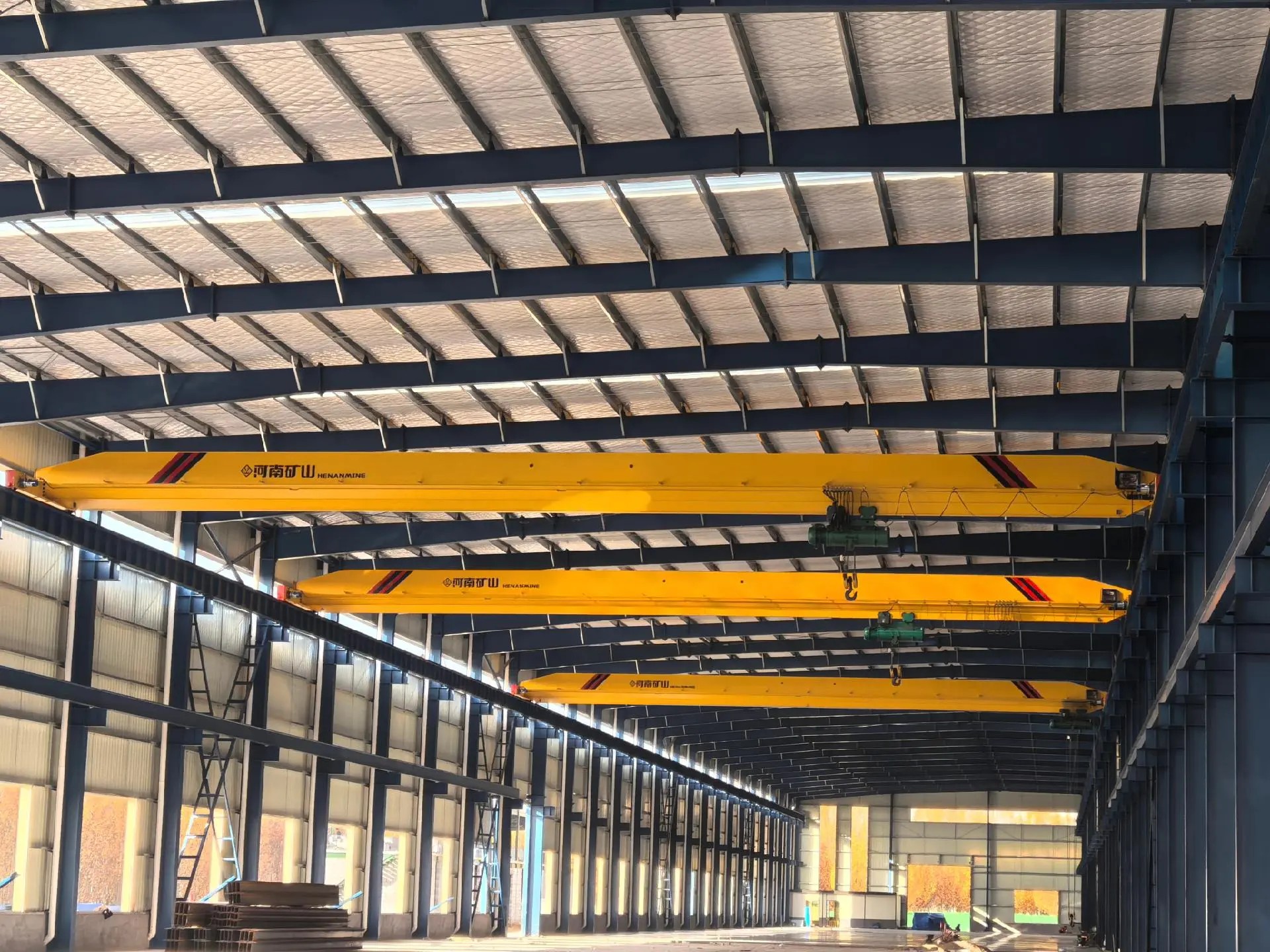 Multiple heavy-duty overhead cranes